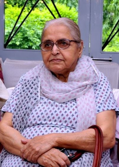 Prof Vidya Gupta seated outdoors